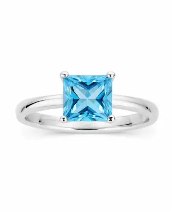 Princess Cut Topaz 4-Prong Ring in 925 Sterling Silver on a clean white background